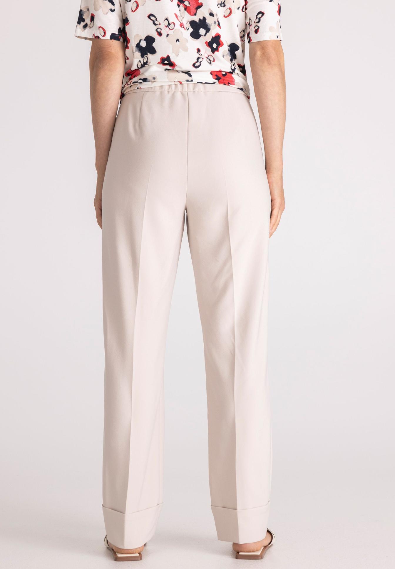 Hose, Beige, Weite Bein, Paket-Umklapp, Ungerader Taschen, beige Hose, weite Beinform, helle Farbe, glatte Oberfläche, Saumweite, Hose, Beige, Weite, gerade Saum, Rückenansicht